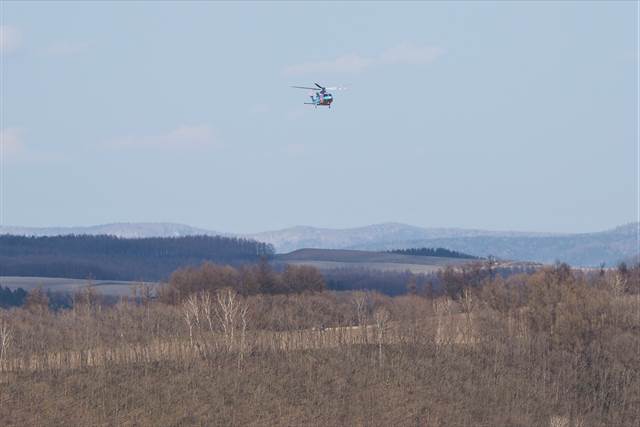 スピード違反取締りの警察ヘリコプター